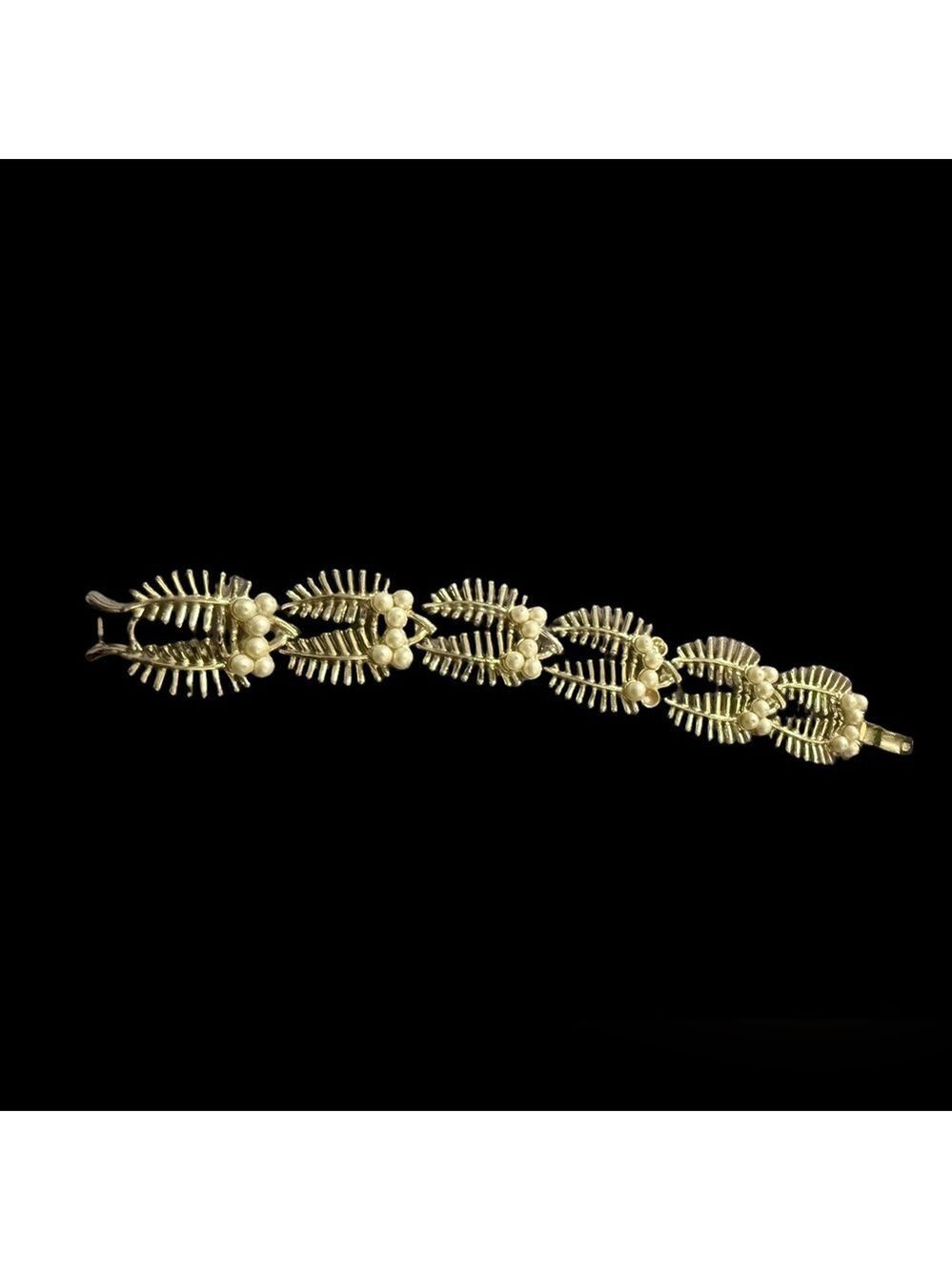 Gold tone vintage Coro Pegasus leaf skeletal design bracelet 1940s 1950s